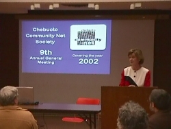 [Photo: Chebucto Chair Marilyn MacDonald at AGM 2002]  